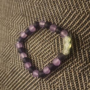 This bracelet is limited edition. It's purple and black